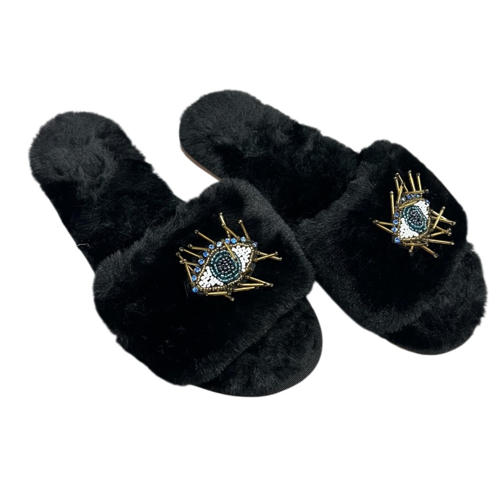 Elegant Black Furry Women's Slippers with Eye Embellishment